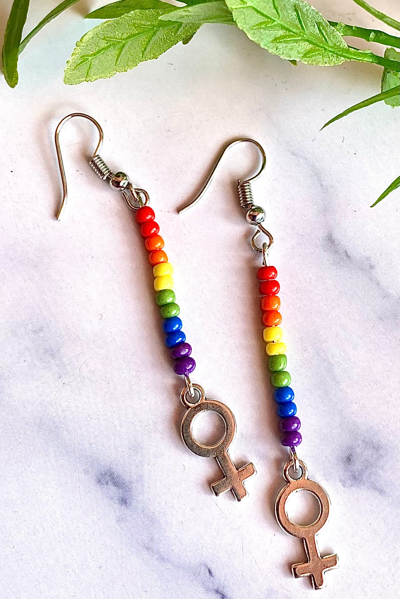 Rainbow Bead Earrings w Female Symbol